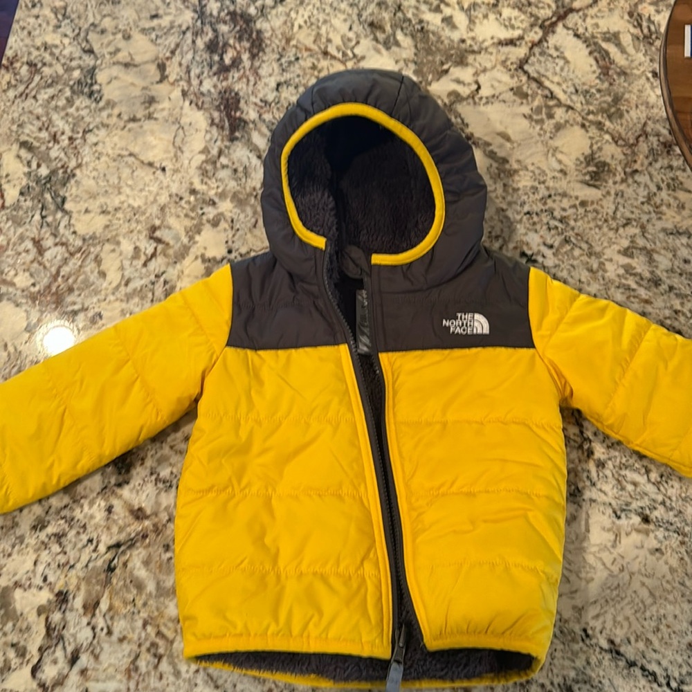 Reversible North face jacket. Size: 18-24 months. Non smoking home